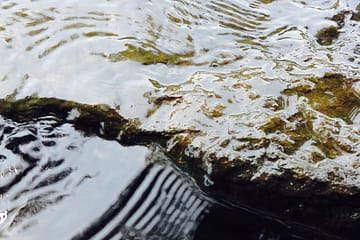 water rippling over rock